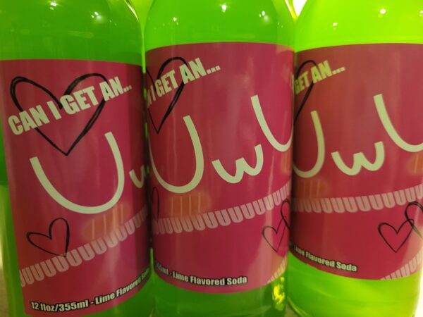 Three bottles of UwU, lime flavored soda.